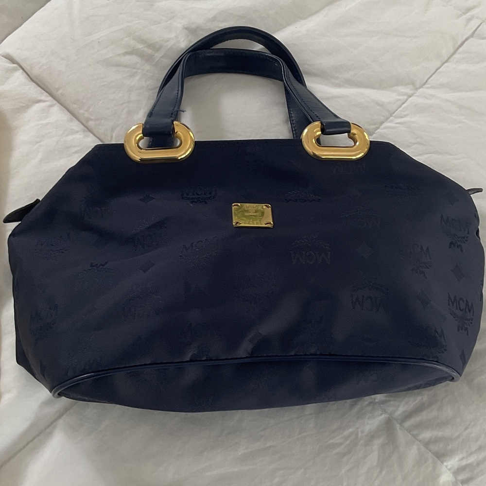 MCM like new Dark Blue bag with Gold Accents, with dust bag